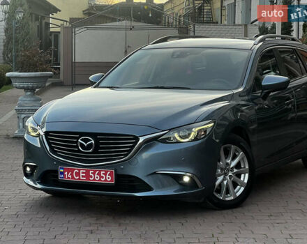 Синій Мазда 6, об'ємом двигуна 2.2 л та пробігом 233 тис. км за 11999 $, фото 4 на Automoto.ua