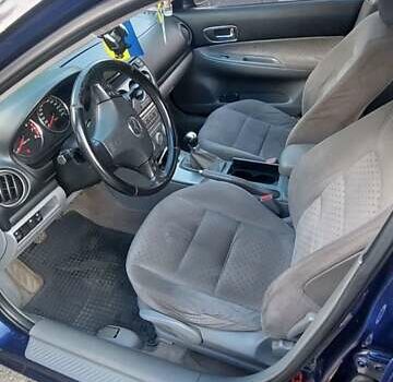 Синий Мазда 6, объемом двигателя 1.8 л и пробегом 250 тыс. км за 4500 $, фото 4 на Automoto.ua