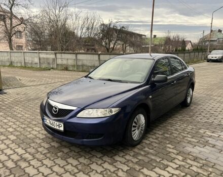Синий Мазда 6, объемом двигателя 2 л и пробегом 299 тыс. км за 2649 $, фото 1 на Automoto.ua