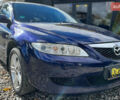 Синий Мазда 6, объемом двигателя 1.8 л и пробегом 199 тыс. км за 4400 $, фото 1 на Automoto.ua