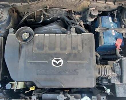 Синий Мазда 6, объемом двигателя 1.8 л и пробегом 250 тыс. км за 4500 $, фото 1 на Automoto.ua