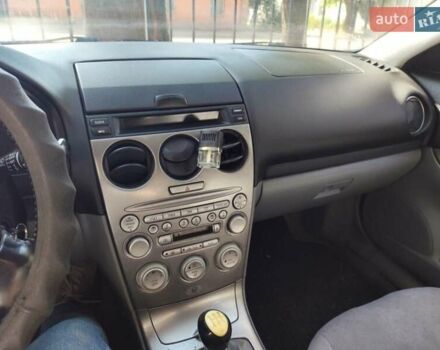 Синий Мазда 6, объемом двигателя 2 л и пробегом 257 тыс. км за 3300 $, фото 23 на Automoto.ua
