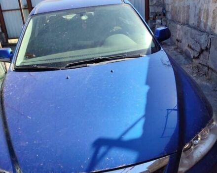 Синий Мазда 6, объемом двигателя 2 л и пробегом 257 тыс. км за 3300 $, фото 2 на Automoto.ua