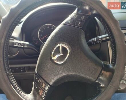 Синий Мазда 6, объемом двигателя 2 л и пробегом 257 тыс. км за 3300 $, фото 22 на Automoto.ua