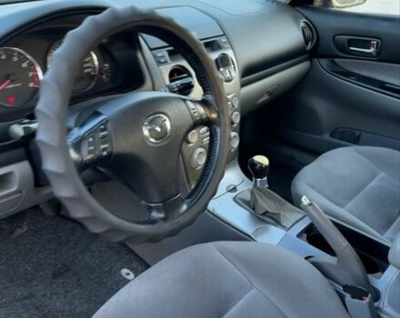 Синий Мазда 6, объемом двигателя 2 л и пробегом 250 тыс. км за 3200 $, фото 5 на Automoto.ua