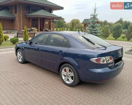 Синий Мазда 6, объемом двигателя 2 л и пробегом 300 тыс. км за 3900 $, фото 6 на Automoto.ua