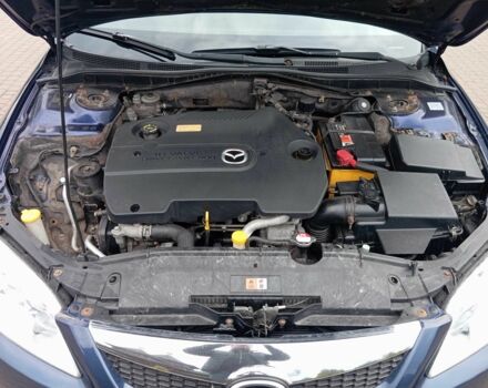 Синий Мазда 6, объемом двигателя 2 л и пробегом 300 тыс. км за 3900 $, фото 5 на Automoto.ua