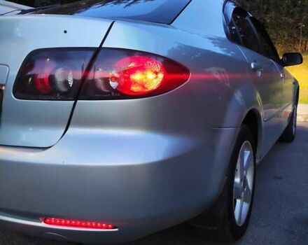 Синий Мазда 6, объемом двигателя 2 л и пробегом 300 тыс. км за 5500 $, фото 4 на Automoto.ua