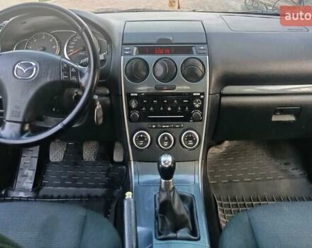 Синій Мазда 6, об'ємом двигуна 2 л та пробігом 337 тис. км за 3800 $, фото 9 на Automoto.ua