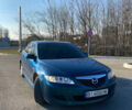 Синий Мазда 6, объемом двигателя 2 л и пробегом 250 тыс. км за 4200 $, фото 1 на Automoto.ua