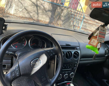 Синий Мазда 6, объемом двигателя 2 л и пробегом 300 тыс. км за 4600 $, фото 3 на Automoto.ua