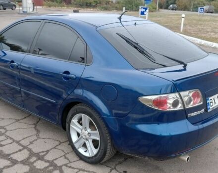 Синий Мазда 6, объемом двигателя 2 л и пробегом 168 тыс. км за 3300 $, фото 2 на Automoto.ua