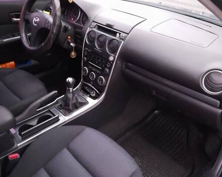 Синий Мазда 6, объемом двигателя 1.8 л и пробегом 205 тыс. км за 4800 $, фото 1 на Automoto.ua