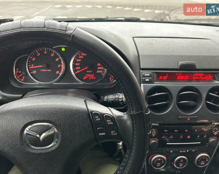 Синий Мазда 6, объемом двигателя 2 л и пробегом 177 тыс. км за 5500 $, фото 14 на Automoto.ua
