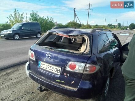 Синий Мазда 6, объемом двигателя 1.9 л и пробегом 280 тыс. км за 700 $, фото 1 на Automoto.ua