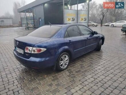 Синий Мазда 6, объемом двигателя 1.8 л и пробегом 350 тыс. км за 4000 $, фото 1 на Automoto.ua