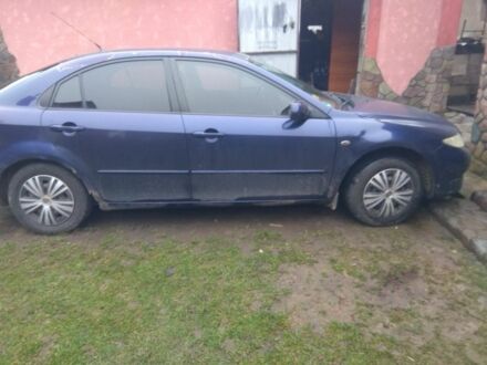 Синий Мазда 6, объемом двигателя 1.8 л и пробегом 360 тыс. км за 1100 $, фото 1 на Automoto.ua