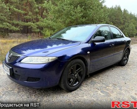 Синий Мазда 6, объемом двигателя 2 л и пробегом 247 тыс. км за 3950 $, фото 1 на Automoto.ua