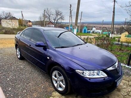 Синий Мазда 6, объемом двигателя 2 л и пробегом 231 тыс. км за 2600 $, фото 1 на Automoto.ua