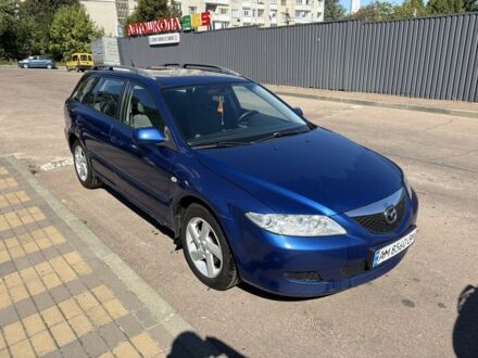 Синий Мазда 6, объемом двигателя 2 л и пробегом 300 тыс. км за 2206 $, фото 1 на Automoto.ua