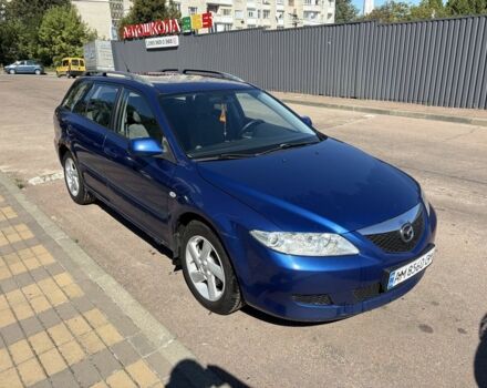 Синий Мазда 6, объемом двигателя 2 л и пробегом 300 тыс. км за 2206 $, фото 1 на Automoto.ua