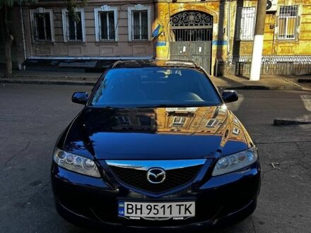 Синий Мазда 6, объемом двигателя 2 л и пробегом 318 тыс. км за 2999 $, фото 1 на Automoto.ua