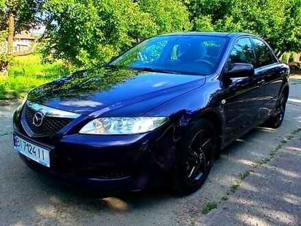 Синий Мазда 6, объемом двигателя 2 л и пробегом 317 тыс. км за 3400 $, фото 1 на Automoto.ua