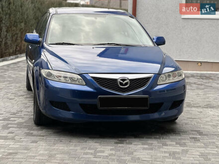 Синий Мазда 6, объемом двигателя 2 л и пробегом 270 тыс. км за 4250 $, фото 1 на Automoto.ua