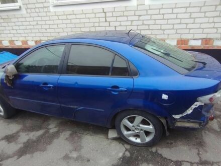 Синий Мазда 6, объемом двигателя 2 л и пробегом 260 тыс. км за 800 $, фото 1 на Automoto.ua