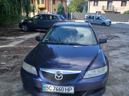 Синий Мазда 6, объемом двигателя 2 л и пробегом 304 тыс. км за 2058 $, фото 1 на Automoto.ua