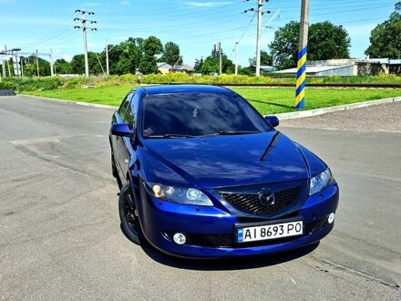 Синий Мазда 6, объемом двигателя 2 л и пробегом 380 тыс. км за 3800 $, фото 1 на Automoto.ua