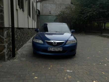 Синий Мазда 6, объемом двигателя 2 л и пробегом 325 тыс. км за 2850 $, фото 1 на Automoto.ua