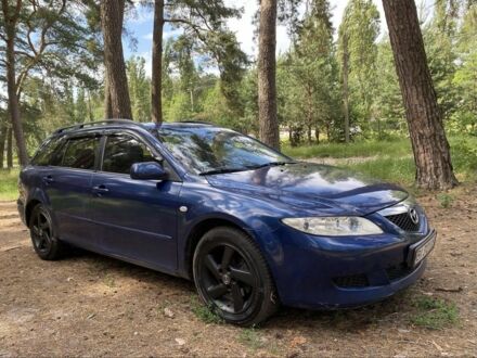 Синий Мазда 6, объемом двигателя 2 л и пробегом 285 тыс. км за 2950 $, фото 1 на Automoto.ua