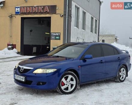 Синий Мазда 6, объемом двигателя 2 л и пробегом 242 тыс. км за 3999 $, фото 1 на Automoto.ua
