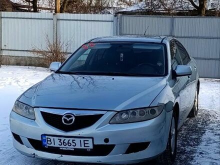 Синий Мазда 6, объемом двигателя 2 л и пробегом 274 тыс. км за 3000 $, фото 1 на Automoto.ua