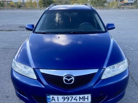 Синий Мазда 6, объемом двигателя 2 л и пробегом 350 тыс. км за 1999 $, фото 1 на Automoto.ua