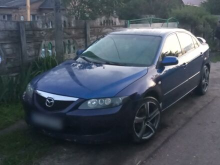 Синий Мазда 6, объемом двигателя 2 л и пробегом 300 тыс. км за 3150 $, фото 1 на Automoto.ua