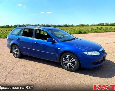 Синий Мазда 6, объемом двигателя 2 л и пробегом 381 тыс. км за 3000 $, фото 1 на Automoto.ua
