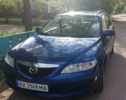 Синий Мазда 6, объемом двигателя 2 л и пробегом 210 тыс. км за 2610 $, фото 1 на Automoto.ua