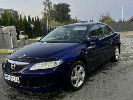 Синий Мазда 6, объемом двигателя 2 л и пробегом 336 тыс. км за 3950 $, фото 1 на Automoto.ua