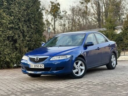 Синий Мазда 6, объемом двигателя 2 л и пробегом 268 тыс. км за 2450 $, фото 1 на Automoto.ua