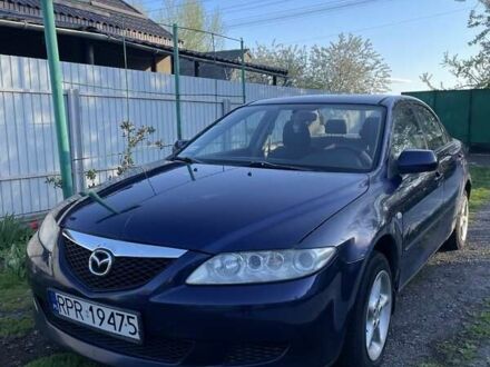 Синий Мазда 6, объемом двигателя 2 л и пробегом 367 тыс. км за 1800 $, фото 1 на Automoto.ua