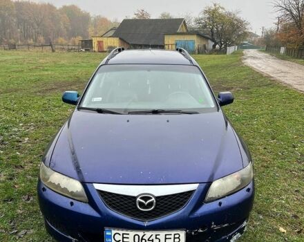 Синий Мазда 6, объемом двигателя 2 л и пробегом 300 тыс. км за 1800 $, фото 1 на Automoto.ua