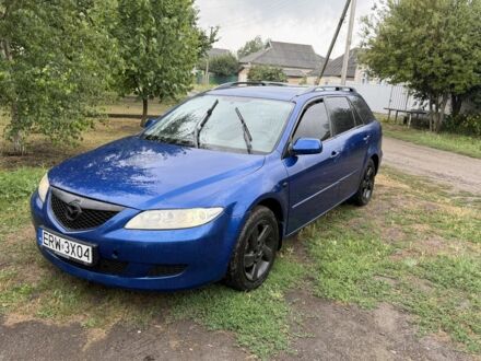 Синий Мазда 6, объемом двигателя 2 л и пробегом 283 тыс. км за 1400 $, фото 1 на Automoto.ua