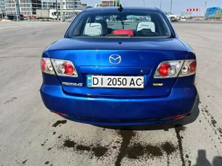 Синий Мазда 6, объемом двигателя 2 л и пробегом 447 тыс. км за 2000 $, фото 1 на Automoto.ua