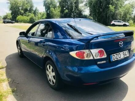 Синий Мазда 6, объемом двигателя 1.8 л и пробегом 280 тыс. км за 2300 $, фото 1 на Automoto.ua