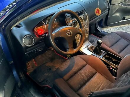 Синій Мазда 6, об'ємом двигуна 2 л та пробігом 333 тис. км за 2400 $, фото 1 на Automoto.ua