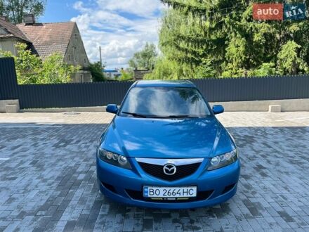Синий Мазда 6, объемом двигателя 2 л и пробегом 354 тыс. км за 3850 $, фото 1 на Automoto.ua