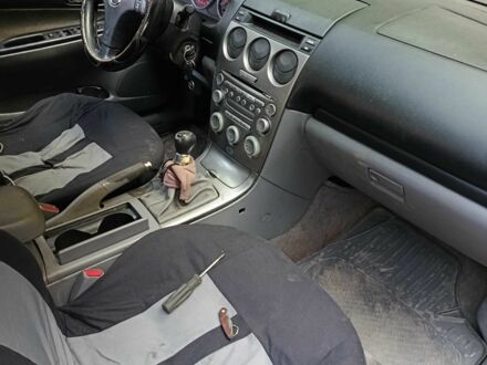 Синий Мазда 6, объемом двигателя 2 л и пробегом 300 тыс. км за 1600 $, фото 1 на Automoto.ua