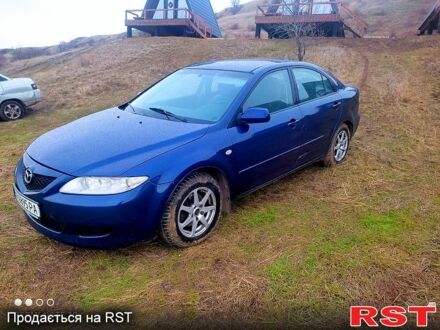 Синий Мазда 6, объемом двигателя 2 л и пробегом 300 тыс. км за 3700 $, фото 1 на Automoto.ua